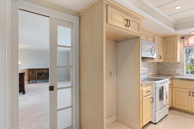 kitchen featuring light countertops, backsplash, light brown cabinetry, ornamental molding, and white appliances