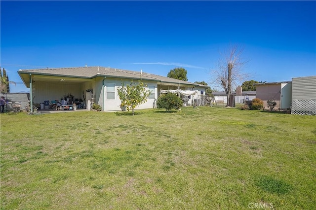 view of yard featuring fence