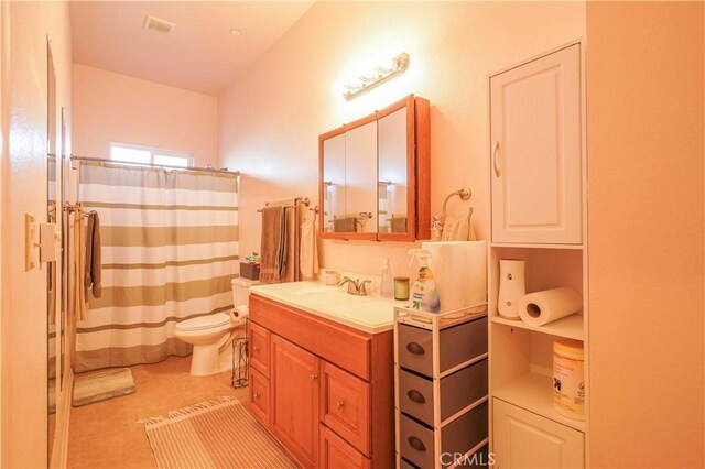 full bath featuring visible vents, toilet, vanity, a shower with curtain, and tile patterned floors