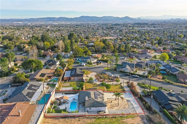 bird's eye view with a residential view and a mountain view