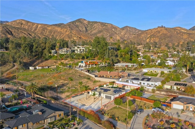 drone / aerial view with a residential view and a mountain view