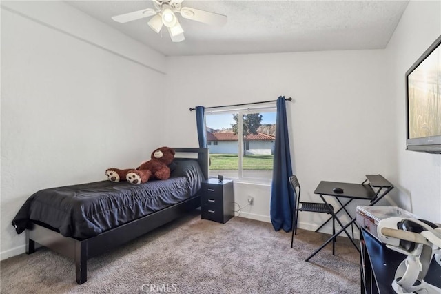 carpeted bedroom with ceiling fan, lofted ceiling, and baseboards