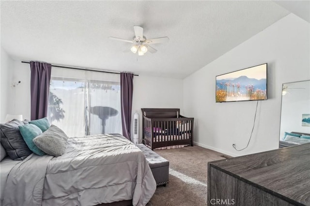 bedroom with baseboards, ceiling fan, carpet, vaulted ceiling, and a textured ceiling