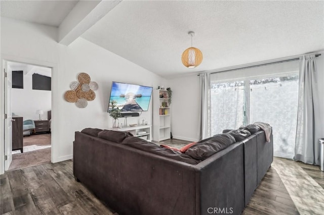 living area featuring vaulted ceiling with beams, a textured ceiling, baseboards, and dark wood-type flooring