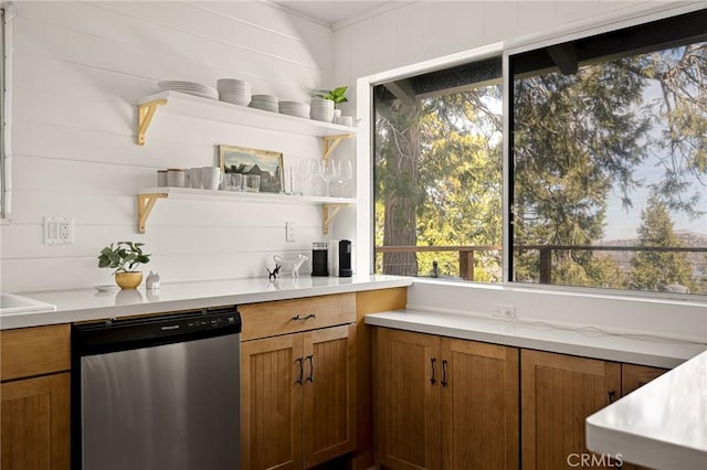 kitchen featuring light countertops, brown cabinets, dishwasher, and open shelves