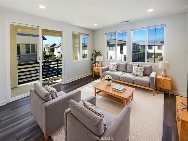 3622 E Delight Paseo Unit 112, Ontario, CA 91761 - living room with recessed lighting, baseboards, and visible vents