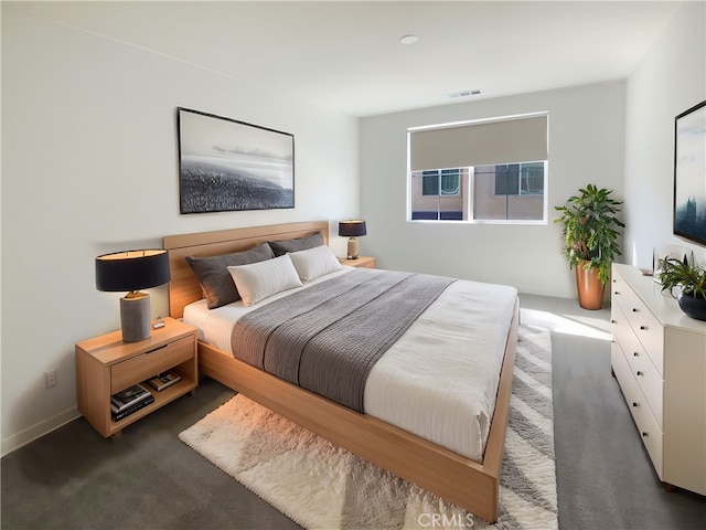 carpeted bedroom with visible vents