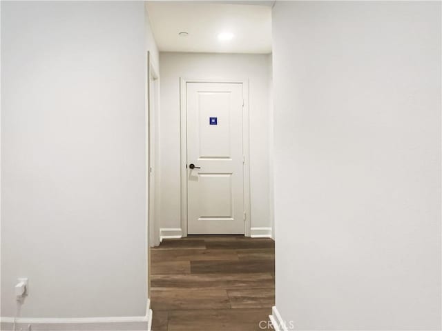 3622 E Delight Paseo Unit 112, Ontario, CA 91761 - corridor featuring baseboards and dark wood-style flooring
