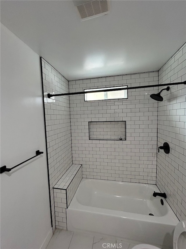 full bathroom featuring visible vents, toilet, tub / shower combination, tile patterned flooring, and baseboards