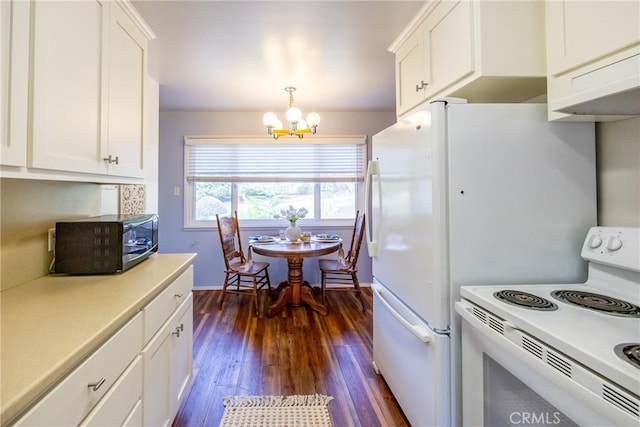 kitchen featuring white electric stove, a chandelier, black microwave, white cabinetry, and dark wood-style floors