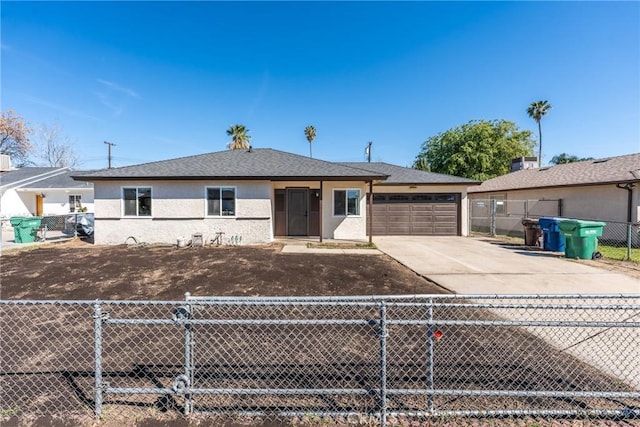 view of front of property featuring a garage, a shingled roof, concrete driveway, a fenced front yard, and stucco siding