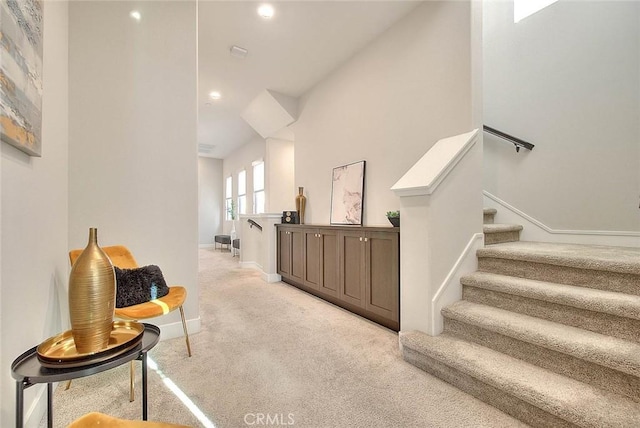 114 Source, Irvine, CA 92618 - corridor with light colored carpet, stairs, and recessed lighting