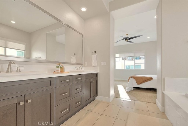 114 Source, Irvine, CA 92618 - full bath with double vanity, ensuite bath, a bath, a ceiling fan, and tile patterned floors