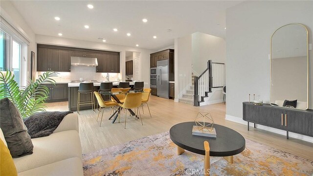 114 Source, Irvine, CA 92618 - dining space with stairway, light wood finished floors, and recessed lighting