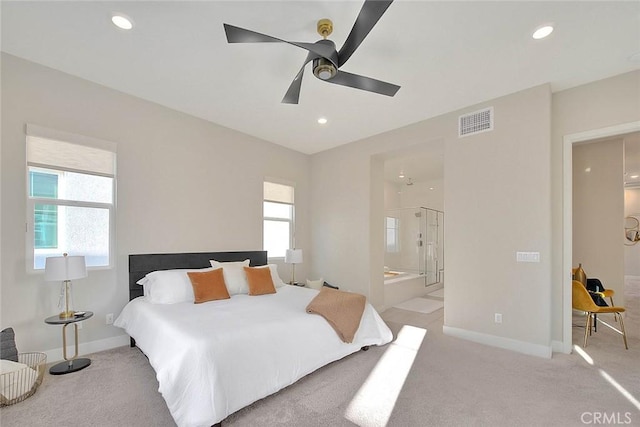 114 Source, Irvine, CA 92618 - bedroom featuring multiple windows, light carpet, recessed lighting, connected bathroom, and a ceiling fan