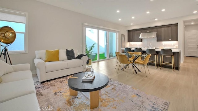 114 Source, Irvine, CA 92618 - living room with plenty of natural light, light wood-type flooring, and recessed lighting