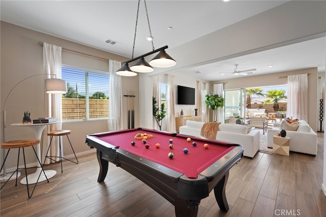 game room with plenty of natural light, billiards, visible vents, and wood finished floors