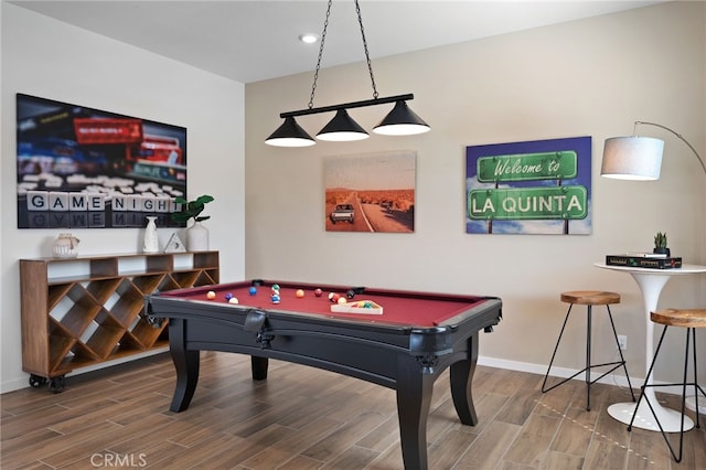 playroom featuring pool table, wood finish floors, and baseboards