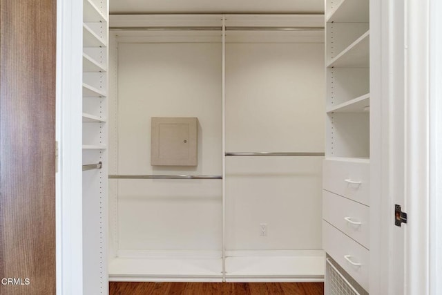 spacious closet with wood finished floors