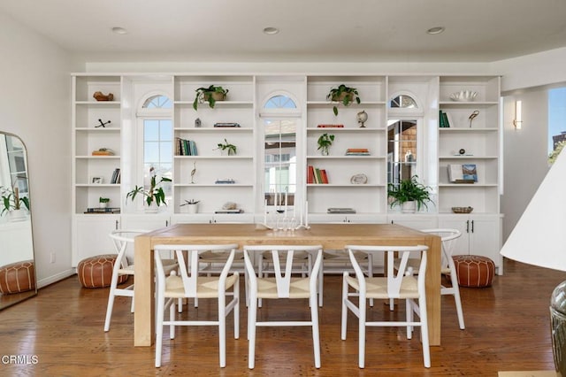 dining area featuring recessed lighting and dark wood-type flooring
