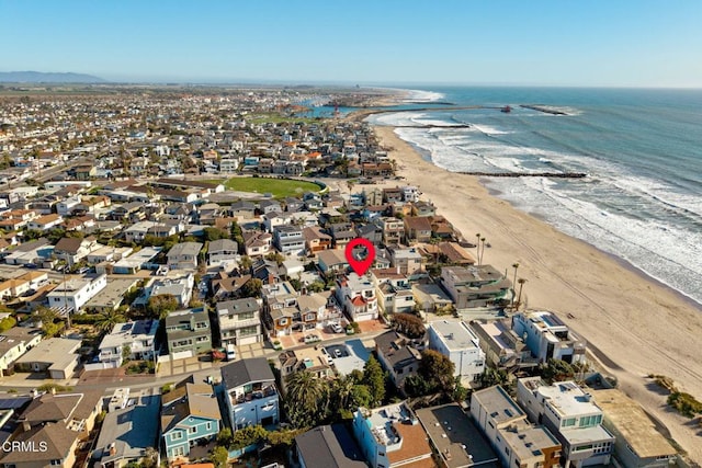 bird's eye view with a residential view, a beach view, and a water view