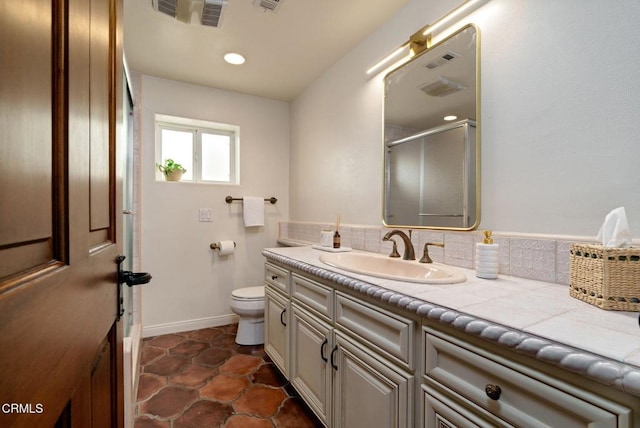 full bath featuring visible vents, baseboards, toilet, an enclosed shower, and vanity