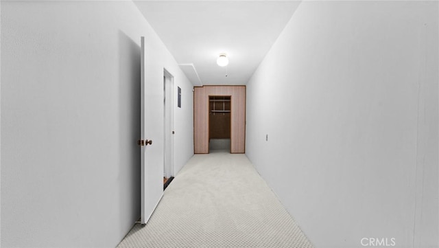 corridor with light carpet