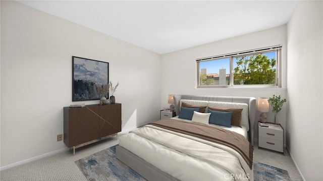 bedroom featuring carpet floors and baseboards