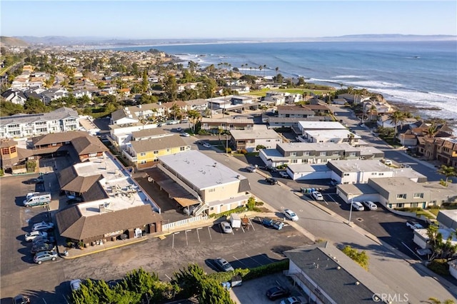 bird's eye view with a water view and a residential view