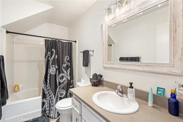 bathroom with shower / bath combination with curtain, vanity, and toilet