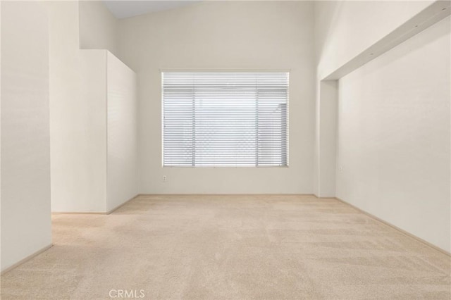 unfurnished room with carpet flooring