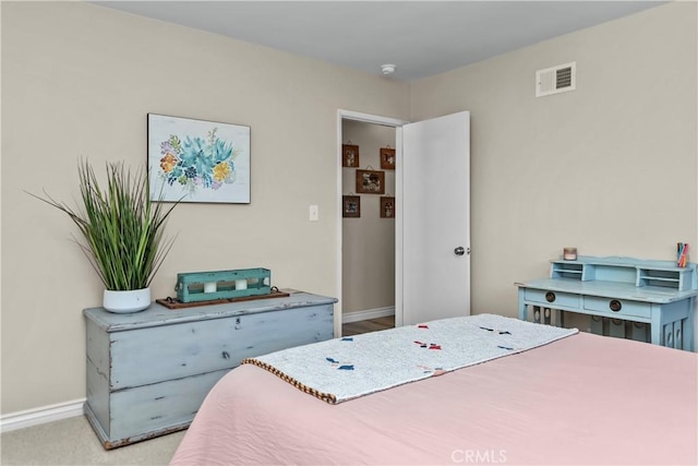 bedroom featuring carpet flooring, baseboards, and visible vents