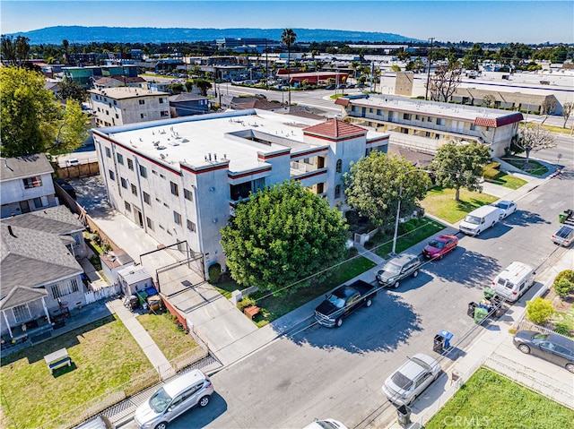 birds eye view of property featuring a mountain view