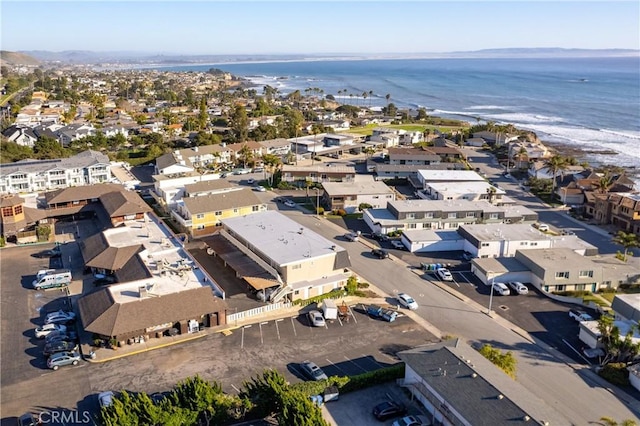 bird's eye view with a water view and a residential view