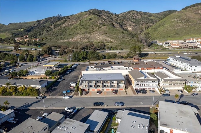 birds eye view of property featuring a mountain view