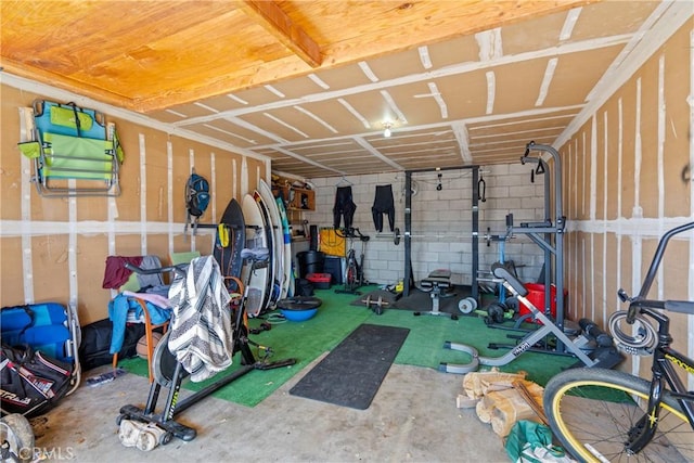 interior space featuring concrete block wall