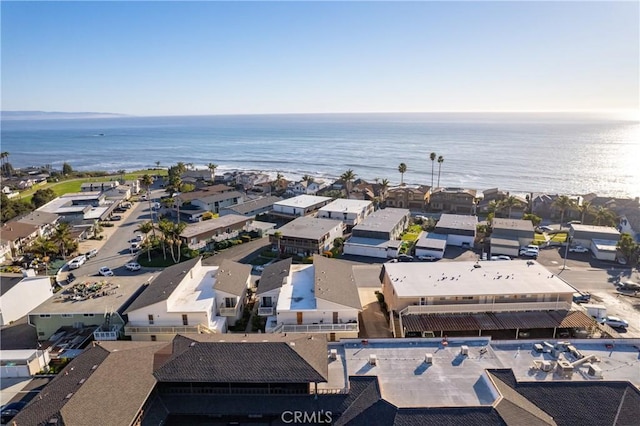 birds eye view of property featuring a water view and a residential view