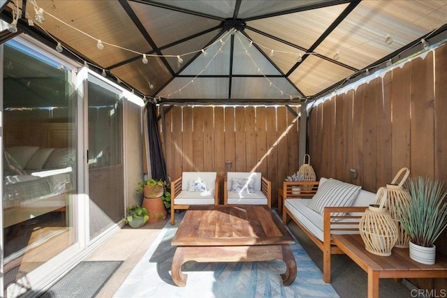 view of patio / terrace featuring an outdoor living space and a gazebo