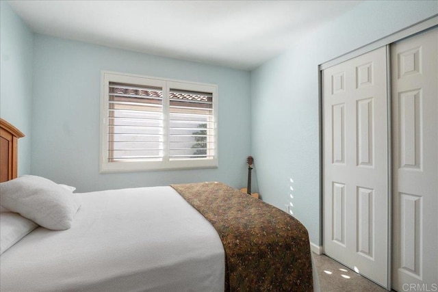 bedroom featuring a closet and carpet flooring