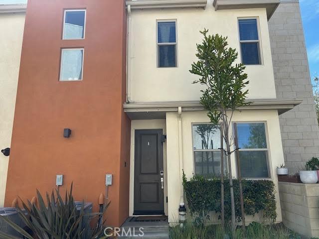 view of front of house featuring stucco siding