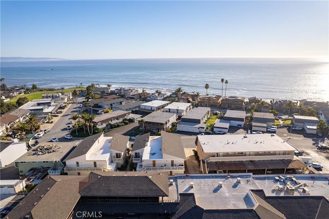 birds eye view of property featuring a water view and a residential view