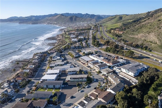 bird's eye view featuring a water and mountain view