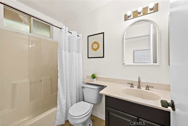bathroom featuring vanity, toilet, and shower / tub combo with curtain