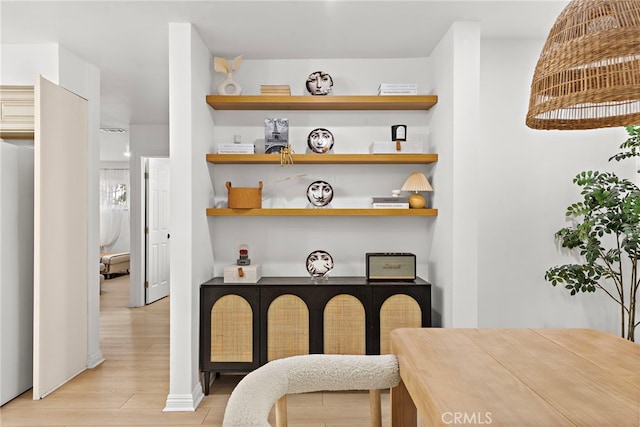 dining room with light wood-type flooring