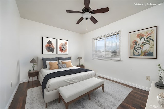 bedroom featuring dark wood finished floors, baseboards, and ceiling fan