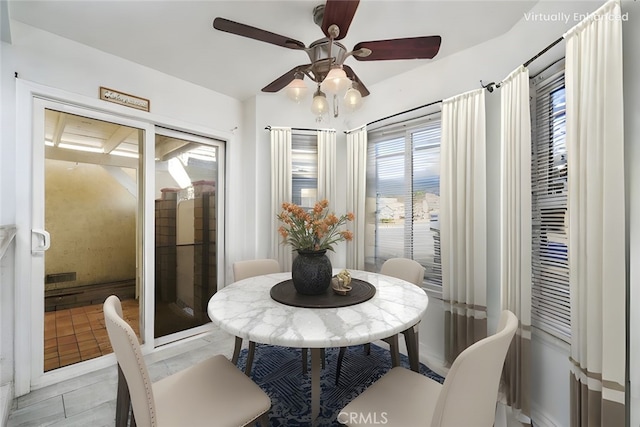 dining room with a ceiling fan