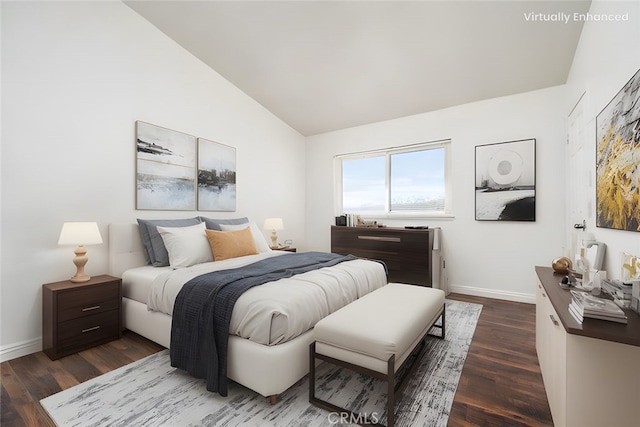 bedroom with lofted ceiling, dark wood-type flooring, and baseboards