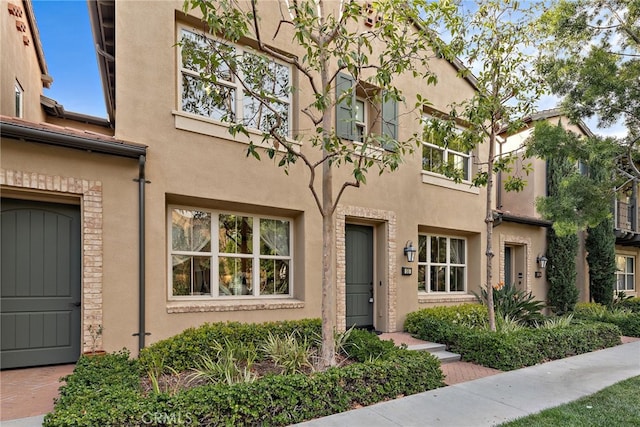 view of property featuring stucco siding