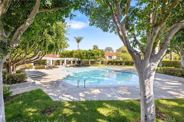 pool with a patio