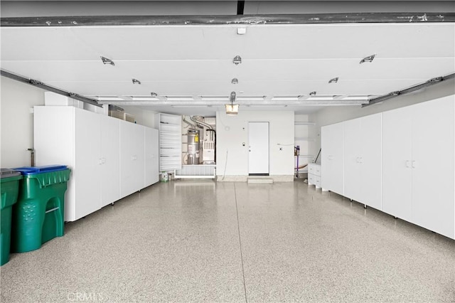 6 Baristo Unit 39, Irvine, CA 92612 - garage featuring secured water heater